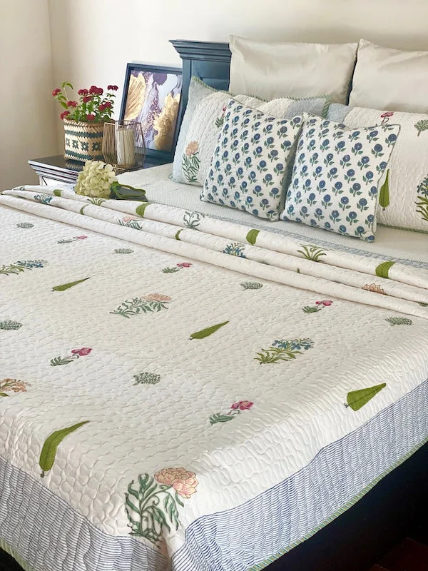 country style bedspreads with floral prints and gingham accents for a homely feelCalm Contrasts Cotton Quilted Bedspread With Pillowcases