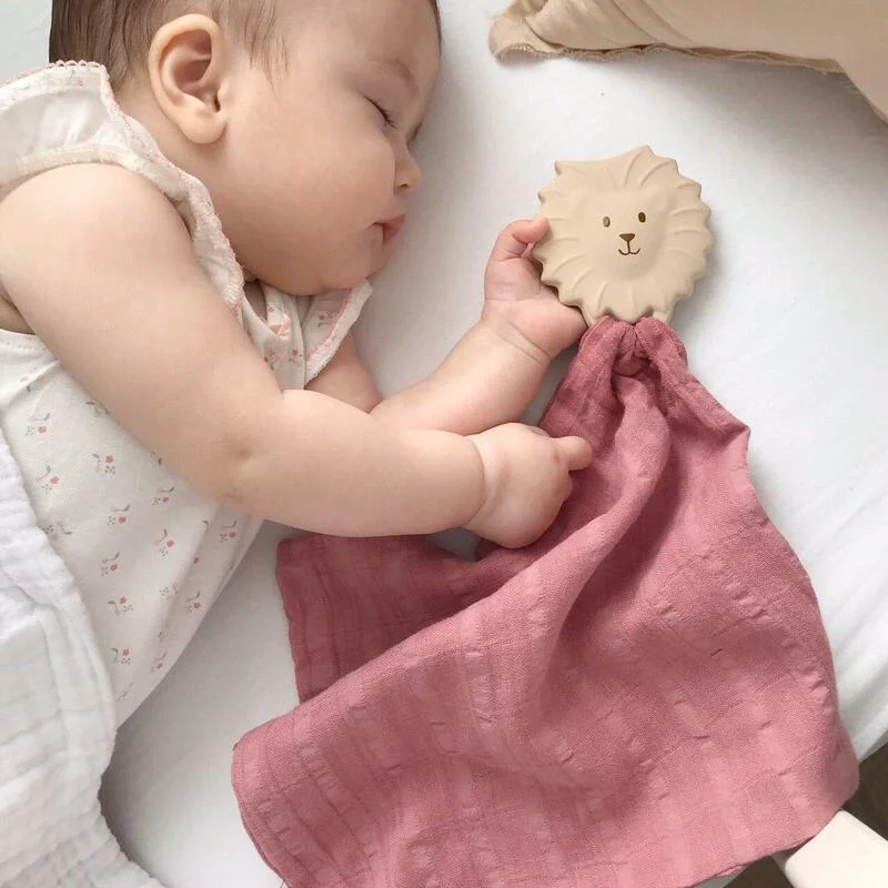 Duck down comforters with a softer feel and good warmth retentionTikiri Rubber Lion Teether with Dusty Pink Organic Muslin Comforter